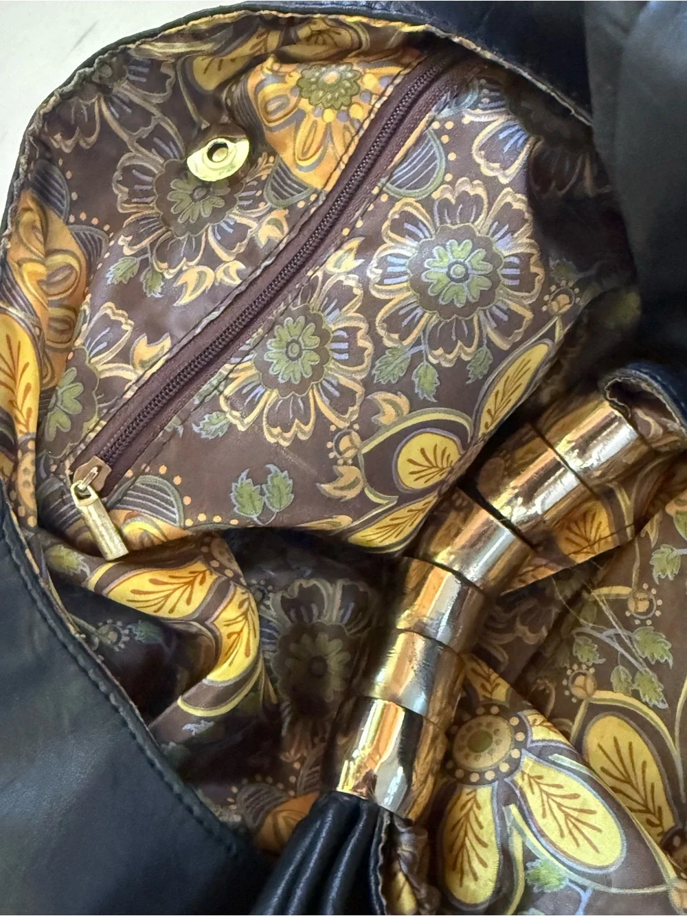 Black Leather Hobo Bag with Patterned Trim